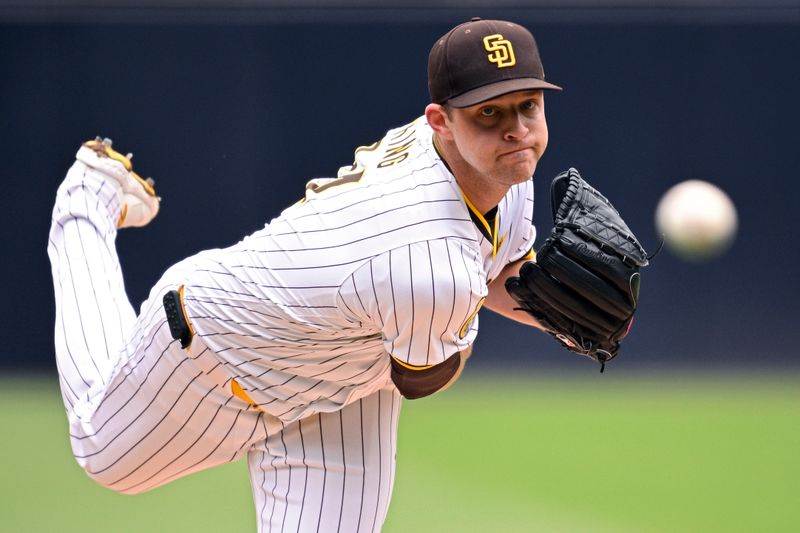 May 15, 2024; San Diego, California, USA; San Diego Padres starting pitcher Michael King (34) throws a pitch against the Colorado Rockies during the first inning at Petco Park. Mandatory Credit: Orlando Ramirez-USA TODAY Sports