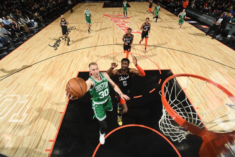 DETROIT, MI - MARCH 22: Sam Hauser #30 of the Boston Celtics drives to the basket during the game against the Detroit Pistons on March 22, 2024 at Little Caesars Arena in Detroit, Michigan. NOTE TO USER: User expressly acknowledges and agrees that, by downloading and/or using this photograph, User is consenting to the terms and conditions of the Getty Images License Agreement. Mandatory Copyright Notice: Copyright 2024 NBAE (Photo by Chris Schwegler/NBAE via Getty Images)