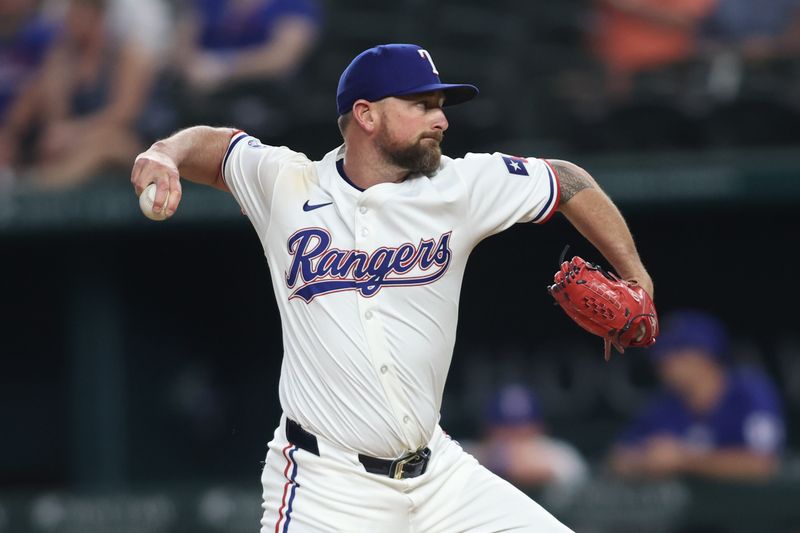 Aug 19, 2024; Arlington, Texas, USA; Texas Rangers pitcher Kirby Yates (39) throws against the Pittsburgh Pirates in the ninth inning at Globe Life Field. Mandatory Credit: Tim Heitman-USA TODAY Sports