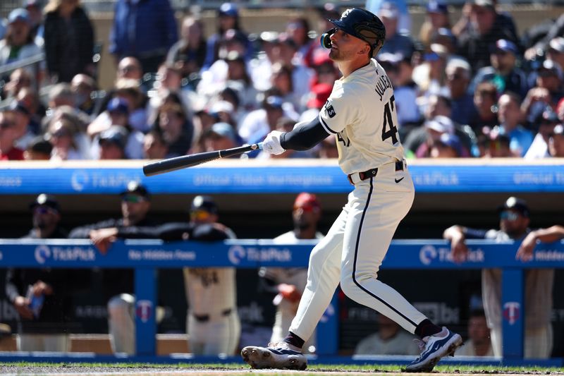 Apr 10, 2024; Minneapolis, Minnesota, USA; Minnesota Twins Edouard Julien (47) hits a solo home run against the Los Angeles Dodgers during the first inning at Target Field. Mandatory Credit: Matt Krohn-USA TODAY Sports