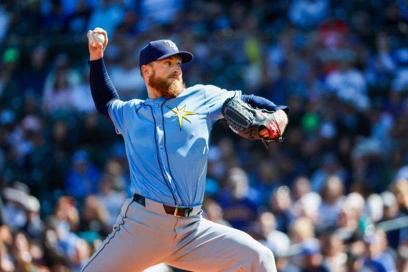 Aug 28, 2024; Seattle, Washington, USA; Tampa Bay Rays starting pitcher Drew Rasmussen (57) throws against the Seattle Mariners during the second inning at T-Mobile Park. Mandatory Credit: Joe Nicholson-USA TODAY Sports