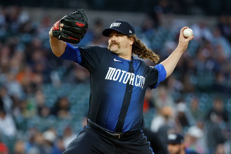 May 10, 2024; Detroit, Michigan, USA;  Detroit Tigers pitcher Andrew Chafin (17) pitches in the eighth inning against the Houston Astros at Comerica Park. Mandatory Credit: Rick Osentoski-USA TODAY Sports