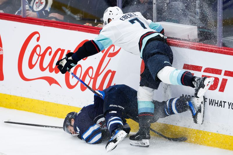 Apr 16, 2024; Winnipeg, Manitoba, CAN;  Seattle Kraken forward Jordan Eberle (7) boards Winnipeg Jets defenseman Josh Morrissey (44) during the third period at Canada Life Centre. Mandatory Credit: Terrence Lee-USA TODAY Sports