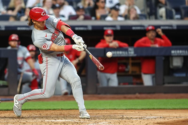 Jul 3, 2024; Bronx, New York, USA; Cincinnati Reds center fielder Stuart Fairchild (17) hits a solo home run in the fifth inning against the New York Yankees at Yankee Stadium. Mandatory Credit: Wendell Cruz-USA TODAY Sports