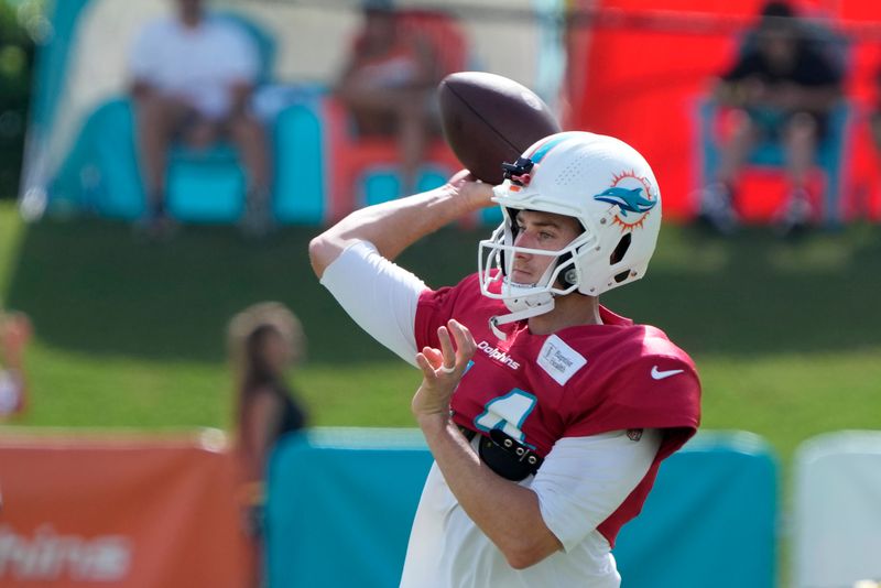 Miami Dolphins quarterback Mike White runs a drill during a joint practice with the Atlanta Falcons at the NFL football team's training facility, Wednesday, Aug. 9, 2023, in Miami Gardens, Fla. (AP Photo/Wilfredo Lee)