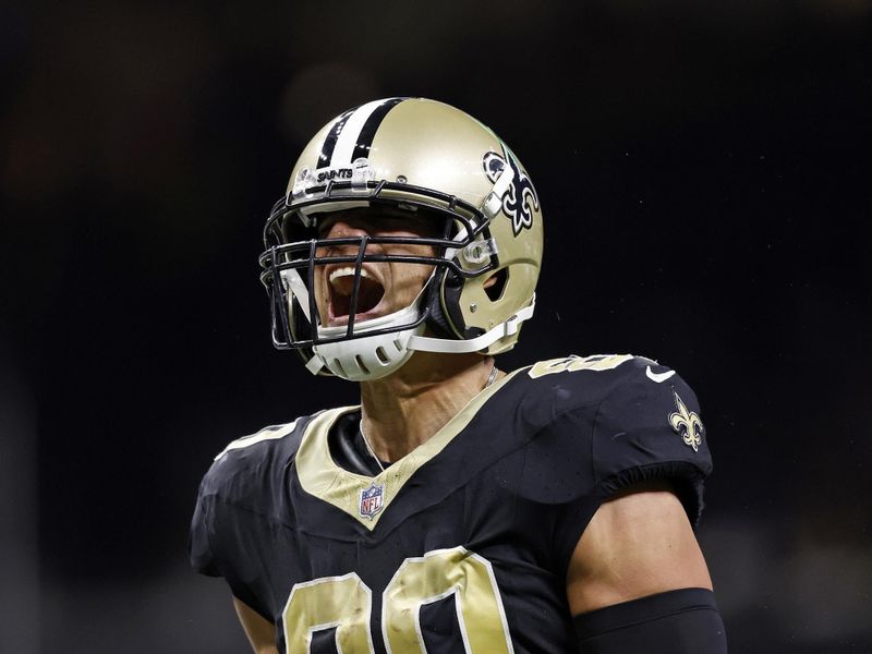 New Orleans Saints tight end Jimmy Graham (80) reacts after making a completion for a first down during an NFL preseason football game against the Houston Texans, Sunday, Aug. 27, 2023, in New Orleans. (AP Photo/Tyler Kaufman)