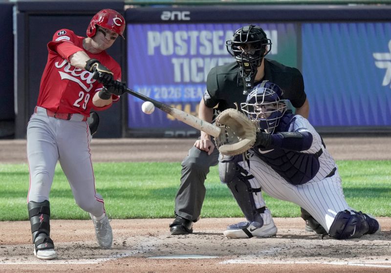 Sep 28, 2025; Milwaukee, Wisconsin, USA; Cincinnati Reds outfielder TJ Friedl (29) hits a solo home run during the third inning of their game against the Milwaukee Brewers at American Family Field. Mandatory Credit: Mark Hoffman-USA TODAY Network via Imagn Images