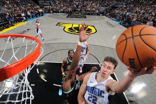 INDIANAPOLIS, IN - DECEMBER 23:  Franz Wagner #22 of the Orlando Magic drives to the basket during the game against the Indiana Pacers on December 23, 2023 at Gainbridge Fieldhouse in Indianapolis, Indiana. NOTE TO USER: User expressly acknowledges and agrees that, by downloading and or using this Photograph, user is consenting to the terms and conditions of the Getty Images License Agreement. Mandatory Copyright Notice: Copyright 2023 NBAE (Photo by Ron Hoskins/NBAE via Getty Images)