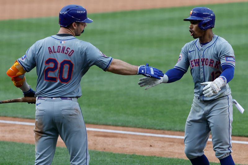 Jun 5, 2024; Washington, District of Columbia, USA; New York Mets shortstop Francisco Lindor (12) celebrates with Mets first baseman Pete Alonso (20) after hitting a home run against the Washington Nationals during the sixth inning at Nationals Park. Mandatory Credit: Geoff Burke-USA TODAY Sports