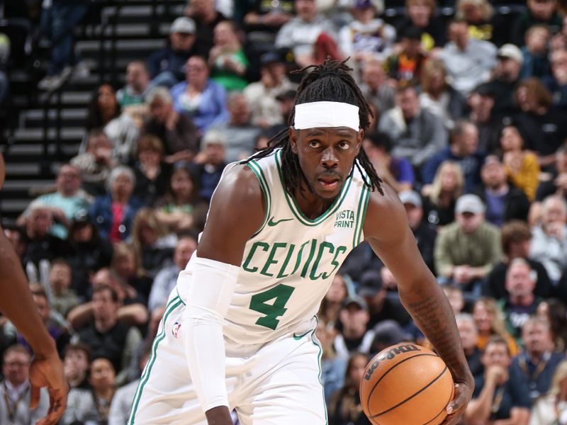 SALT LAKE CITY, UT - MARCH 12:  Jrue Holiday #4 of the Boston Celtics handles the ball during the game  on March 12, 2024 at Delta Center in Salt Lake City, Utah. NOTE TO USER: User expressly acknowledges and agrees that, by downloading and or using this Photograph, User is consenting to the terms and conditions of the Getty Images License Agreement. Mandatory Copyright Notice: Copyright 2024 NBAE (Photo by Melissa Majchrzak/NBAE via Getty Images)