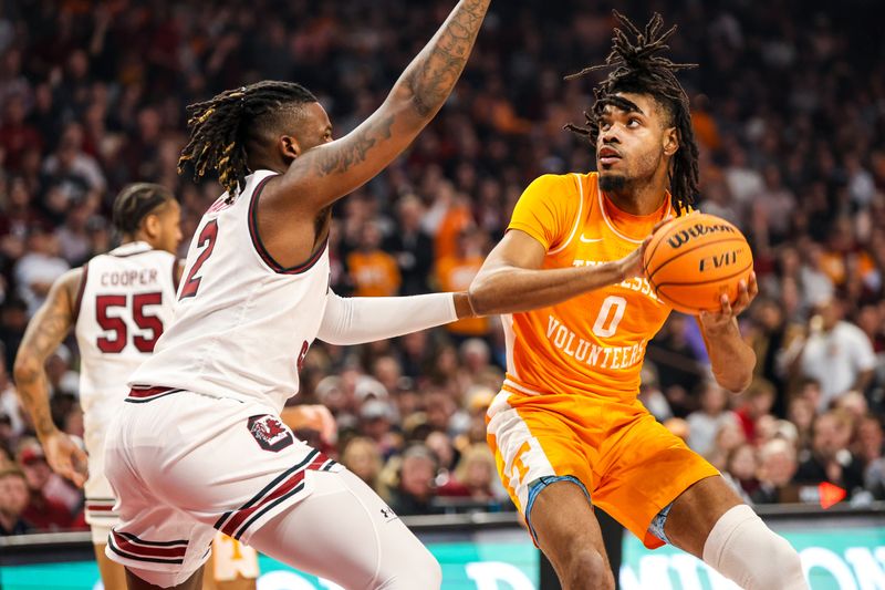 Mar 6, 2024; Columbia, South Carolina, USA; Tennessee Volunteers forward Jonas Aidoo (0) looks to shoot over South Carolina Gamecocks forward B.J. Mack (2) in the first half at Colonial Life Arena. Mandatory Credit: Jeff Blake-USA TODAY Sports