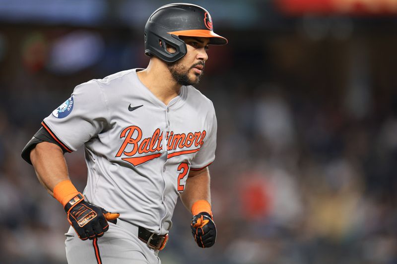 Jun 18, 2024; Bronx, New York, USA; Baltimore Orioles right fielder Anthony Santander (25) runs the bases during his two run home run during the ninth inning against the New York Yankees at Yankee Stadium. Mandatory Credit: Vincent Carchietta-USA TODAY Sports