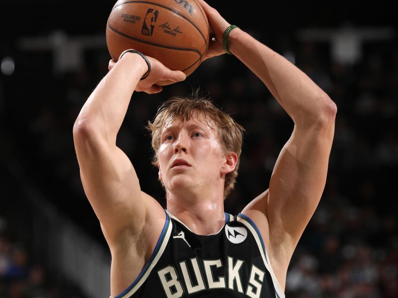 MILWAUKEE, WI - JANUARY 15:  AJ Green #20 of the Milwaukee Bucks shoots a free throw during the game against the Orlando Magic on January 15, 2025 at Fiserv Forum Center in Milwaukee, Wisconsin. NOTE TO USER: User expressly acknowledges and agrees that, by downloading and or using this Photograph, user is consenting to the terms and conditions of the Getty Images License Agreement. Mandatory Copyright Notice: Copyright 2025 NBAE (Photo by Gary Dineen/NBAE via Getty Images).