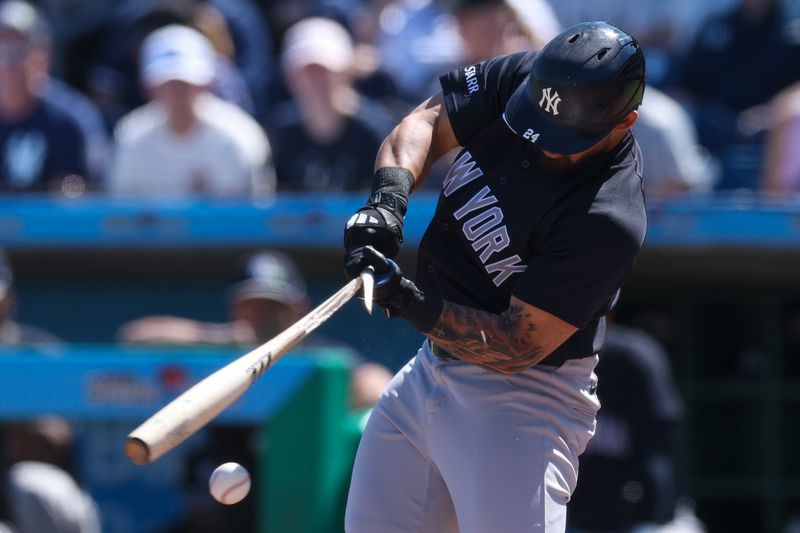 Mar 1, 2026; Clearwater, Florida, USA; New York Yankees left fielder Jasson Dominguez (24) breaks his bat on a foul ball against the Philadelphia Phillies in the first inning during spring training at BayCare Ballpark. Mandatory Credit: Nathan Ray Seebeck-Imagn Images