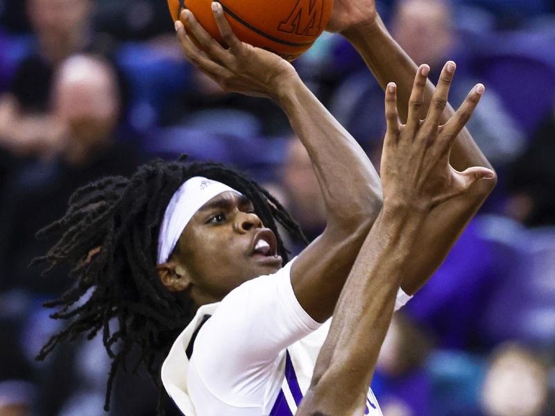 Feb 18, 2023; Seattle, Washington, USA; Washington Huskies guard Keyon Menifield (23) shoots against the Oregon State Beavers during the second half at Alaska Airlines Arena at Hec Edmundson Pavilion. Mandatory Credit: Joe Nicholson-USA TODAY Sports