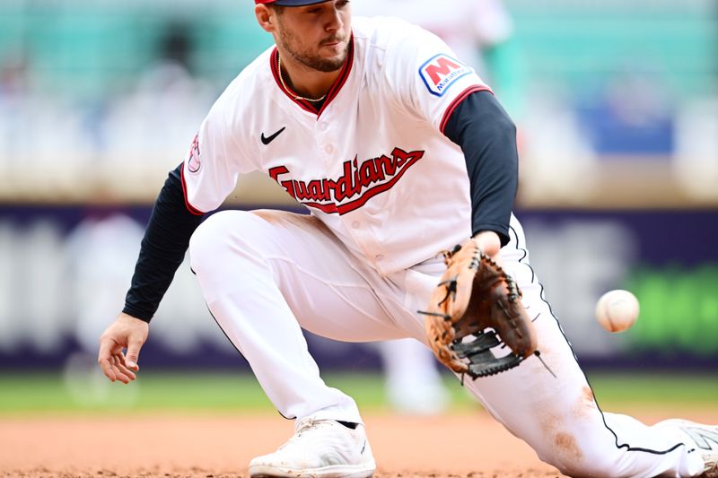 May 28, 2025; Cleveland, Ohio, USA; Cleveland Guardians third baseman Will Wilson (7) fields a ball hit by Los Angeles Dodgers second baseman Miguel Rojas (not pictured) during the fifth inning at Progressive Field. Mandatory Credit: Ken Blaze-Imagn Images