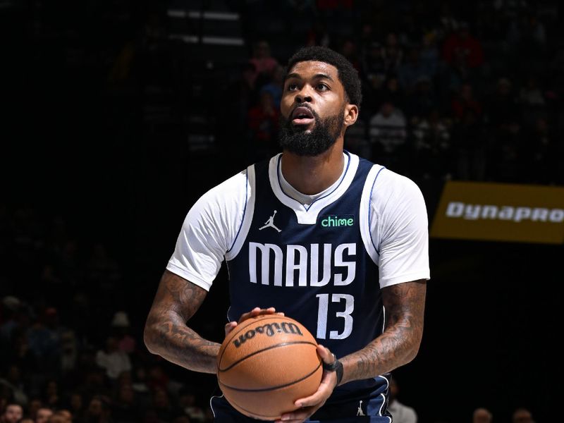 MEMPHIS, TN - JANUARY 6:   Naji Marshall #13 of the Dallas Mavericks shoots a free throw during the game against the Memphis Grizzlies on January  6, 2024 at FedExForum in Memphis, Tennessee. NOTE TO USER: User expressly acknowledges and agrees that, by downloading and or using this photograph, User is consenting to the terms and conditions of the Getty Images License Agreement. Mandatory Copyright Notice: Copyright 2024 NBAE (Photo by Grant Burke/NBAE via Getty Images)