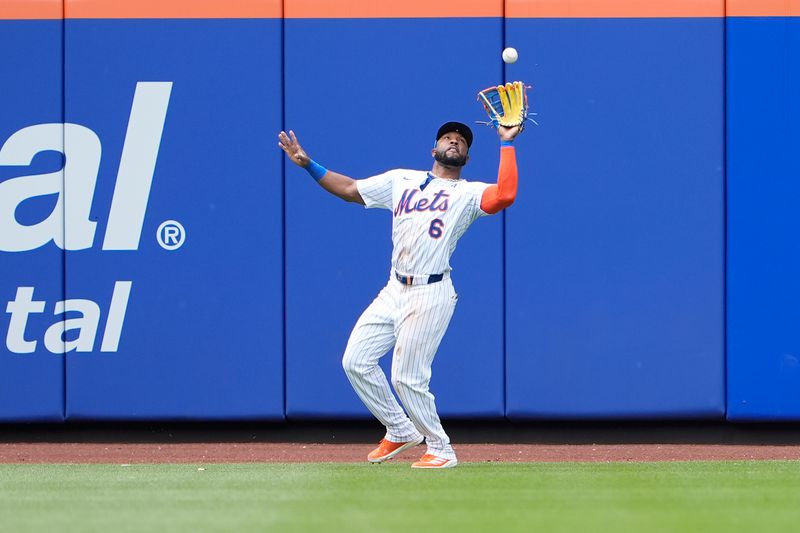 Jun 1, 2025; New York City, New York, USA; New York Mets left fielder Starling Marte (6) catches a fly ball hit by Colorado Rockies center fielder Sam Hilliard (16) (not pictured) during the sixth inning at Citi Field. Mandatory Credit: Gregory Fisher-Imagn Images