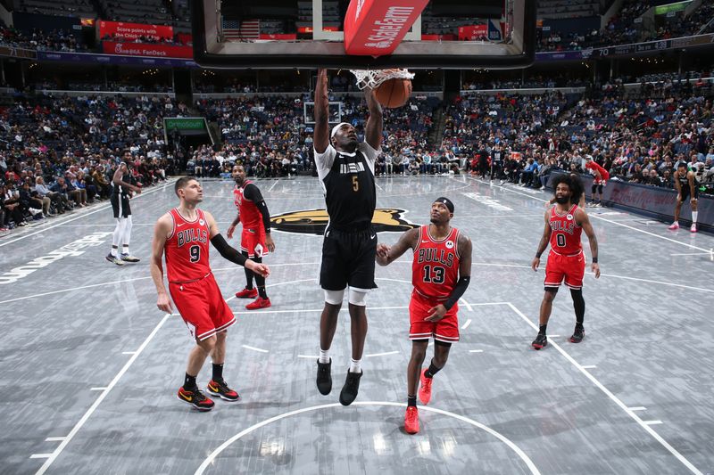 MEMPHIS, TN - FEBRUARY 8: Vince Williams Jr. #5 of the Memphis Grizzlies dunks the ball during the game against the Chicago Bulls on February 8, 2024 at FedExForum in Memphis, Tennessee. NOTE TO USER: User expressly acknowledges and agrees that, by downloading and or using this photograph, User is consenting to the terms and conditions of the Getty Images License Agreement. Mandatory Copyright Notice: Copyright 2024 NBAE (Photo by Joe Murphy/NBAE via Getty Images)