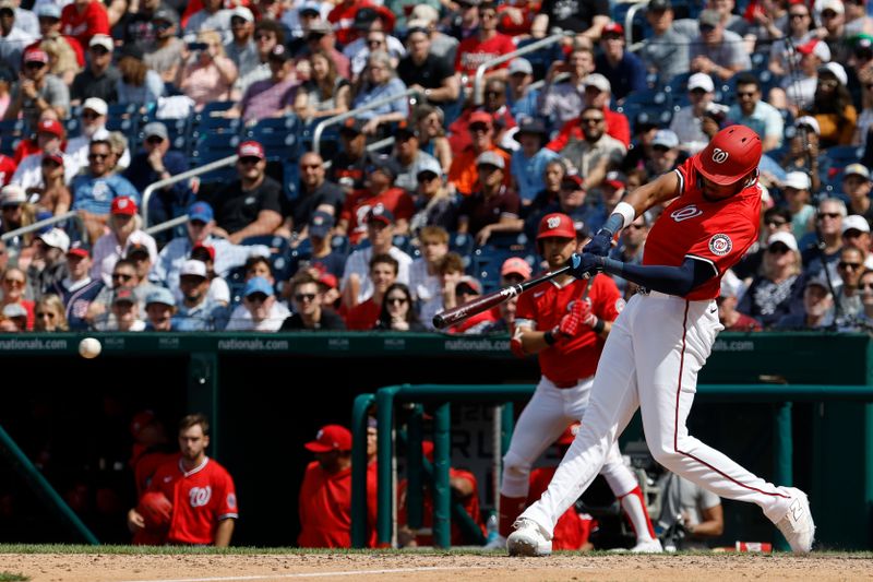 May 25, 2025; Washington, District of Columbia, USA; Washington Nationals outfielder James Wood (29) hits an RBI double against the San Francisco Giants during the ninth inning at Nationals Park. Mandatory Credit: Geoff Burke-Imagn Images