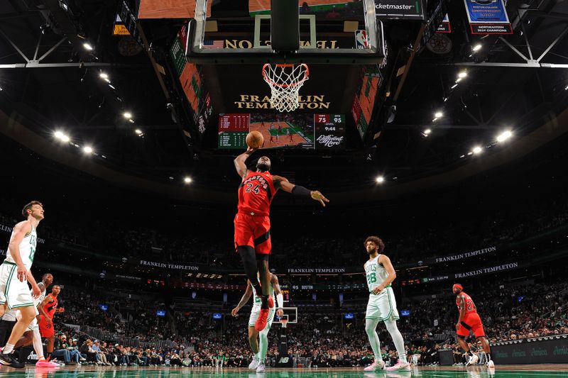 BOSTON, MA - OCTOBER 13: Bruno Fernando #24 of the Toronto Raptors dunks the ball during the game against the Boston Celtics during a NBA pre season game on October 13, 2024 at TD Garden in Boston, Massachusetts. NOTE TO USER: User expressly acknowledges and agrees that, by downloading and/or using this Photograph, user is consenting to the terms and conditions of the Getty Images License Agreement. Mandatory Copyright Notice: Copyright 2024 NBAE (Photo by Brian Babineau/NBAE via Getty Images)