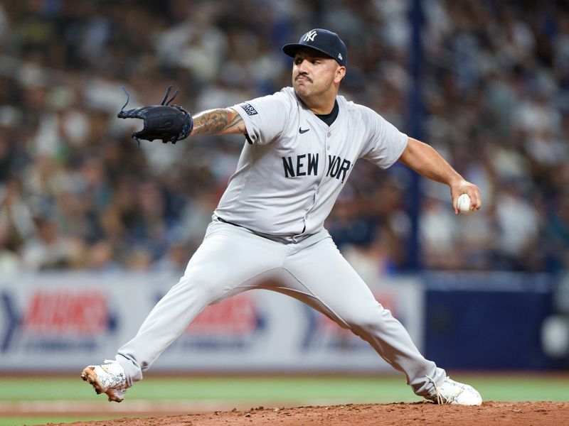 Jul 11, 2024; St. Petersburg, Florida, USA; New York Yankees pitcher Nestor Cortes (65) throws a pitch against the Tampa Bay Rays in the third inning  at Tropicana Field. Mandatory Credit: Nathan Ray Seebeck-USA TODAY Sports