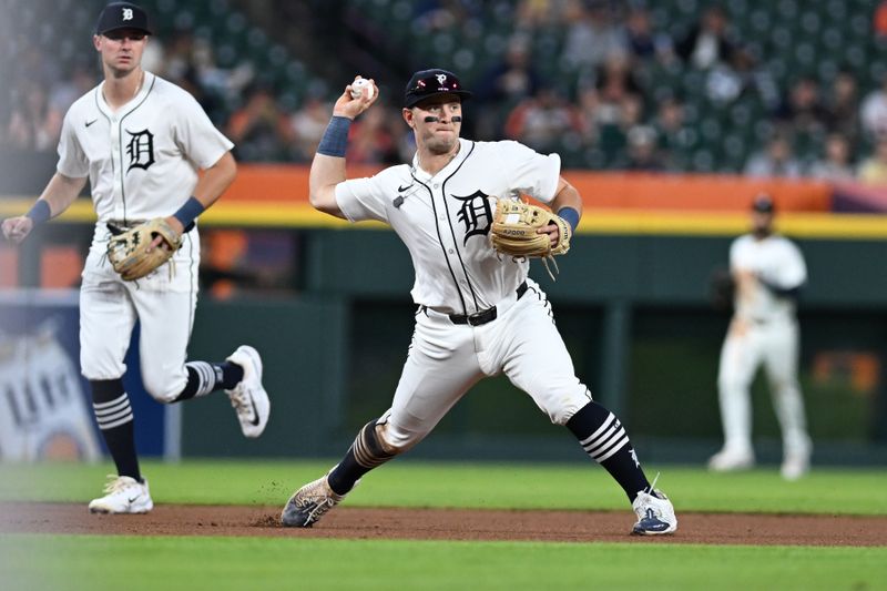 Sep 10, 2024; Detroit, Michigan, USA; Detroit Tigers third baseman Jace Jung (17) throws out a Colorado Rockies baserunner in the sixth inning at Comerica Park. Mandatory Credit: Lon Horwedel-Imagn Images