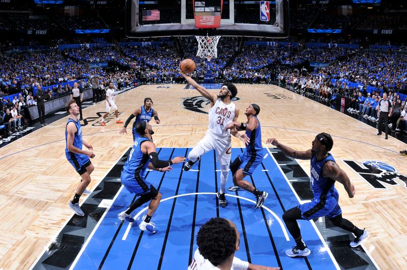 ORLANDO, FL - APRIL 25: Jarrett Allen #31 of the Cleveland Cavaliers goes to the basket during the game  against the Orlando Magic during Round 1 Game 3 of the 2024 NBA Playoffs on April 25, 2024 at Kia Center in Orlando, Florida. NOTE TO USER: User expressly acknowledges and agrees that, by downloading and or using this photograph, User is consenting to the terms and conditions of the Getty Images License Agreement. Mandatory Copyright Notice: Copyright 2023 NBAE (Photo by Fernando Medina/NBAE via Getty Images)