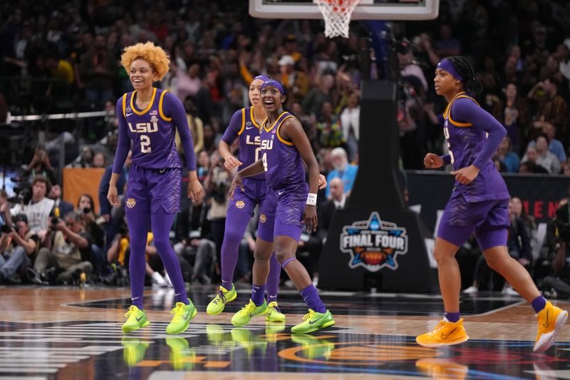 Apr 2, 2023; Dallas, TX, USA; LSU Lady Tigers guard Jasmine Carson (2), guard Last-Tear Poa (13), guard Flau'jae Johnson (4) and guard Alexis Morris (45) celebrate during the NCAA Womens Basketball Final Four National Championship against the Iowa Hawkeyes at American Airlines Center. Mandatory Credit: Kirby Lee-USA TODAY Sports
