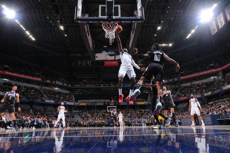 INDIANAPOLIS, IN - MARCH 27: Tim Hardaway Jr. #11 of the Dallas Mavericks drives to the basket during the game against the Indiana Pacers on March 27, 2023 at Gainbridge Fieldhouse in Indianapolis, Indiana. NOTE TO USER: User expressly acknowledges and agrees that, by downloading and or using this Photograph, user is consenting to the terms and conditions of the Getty Images License Agreement. Mandatory Copyright Notice: Copyright 2023 NBAE (Photo by Ron Hoskins/NBAE via Getty Images)