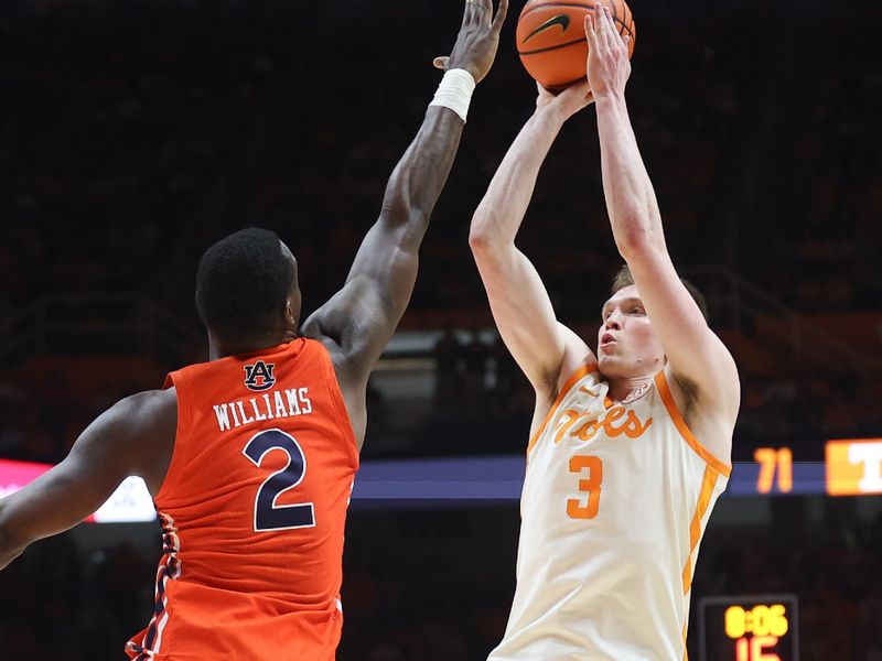 Feb 28, 2024; Knoxville, Tennessee, USA; Tennessee Volunteers guard Dalton Knecht (3) shoots the ball against Auburn Tigers forward Jaylin Williams (2) during the second half at Thompson-Boling Arena at Food City Center. Mandatory Credit: Randy Sartin-USA TODAY Sports