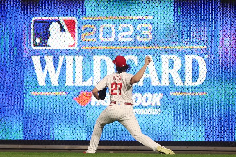 Oct 4, 2023; Philadelphia, Pennsylvania, USA; Philadelphia Phillies starting pitcher Aaron Nola (27) practices before game two of the Wildcard series for the 2023 MLB playoffs against the Miami Marlins at Citizens Bank Park. Mandatory Credit: Bill Streicher-USA TODAY Sports