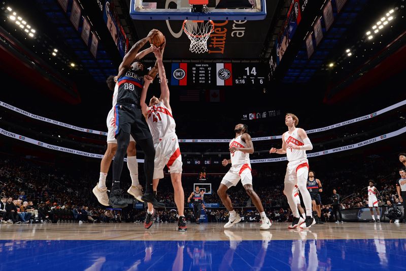 DETROIT, MI - MARCH 13: James Wiseman #13 of the Detroit Pistons rebounds the ball during the game against the Toronto Raptors on March 13, 2024 at Little Caesars Arena in Detroit, Michigan. NOTE TO USER: User expressly acknowledges and agrees that, by downloading and/or using this photograph, User is consenting to the terms and conditions of the Getty Images License Agreement. Mandatory Copyright Notice: Copyright 2024 NBAE (Photo by Chris Schwegler/NBAE via Getty Images)