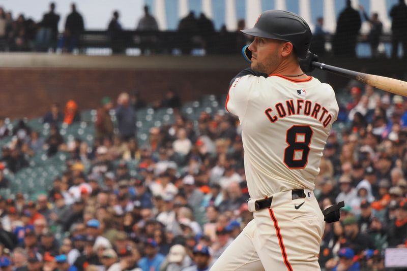 Apr 24, 2024; San Francisco, California, USA; San Francisco Giants left fielder Michael Conforto (8) hits a double against the New York Mets during the seventh inning at Oracle Park. Mandatory Credit: Kelley L Cox-USA TODAY Sports