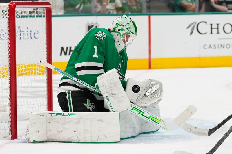 Oct 13, 2024; Dallas, Texas, USA;  Dallas Stars goaltender Casey DeSmith (1) makes a save against the Seattle Kraken during the first period at American Airlines Center. Mandatory Credit: Chris Jones-Imagn Images
