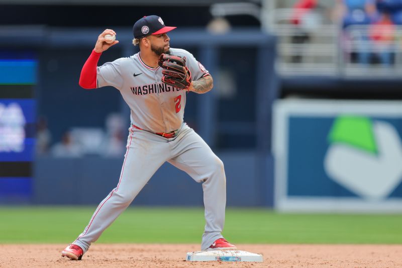 Apr 13, 2025; Miami, Florida, USA; Washington Nationals second baseman Luis Garcia Jr. (2) throws to first base to retire Miami Marlins third baseman Eric Wagaman (not pictured) during the seventh inning at loanDepot Park. Mandatory Credit: Sam Navarro-Imagn Images