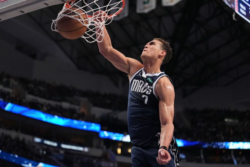 DALLAS, TEXAS - DECEMBER 23: Dwight Powell #7 of the Dallas Mavericks dunks during the second half against the San Antonio Spurs at American Airlines Center on December 23, 2023 in Dallas, Texas. NOTE TO USER: User expressly acknowledges and agrees that, by downloading and or using this photograph, User is consenting to the terms and conditions of the Getty Images License Agreement. (Photo by Sam Hodde/Getty Images)