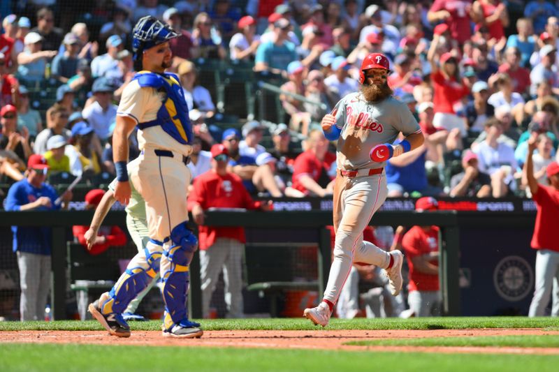 Aug 4, 2024; Seattle, Washington, USA; Philadelphia Phillies center fielder Brandon Marsh (16) scores a run against the Seattle Mariners during the eighth inning at T-Mobile Park. Mandatory Credit: Steven Bisig-USA TODAY Sports