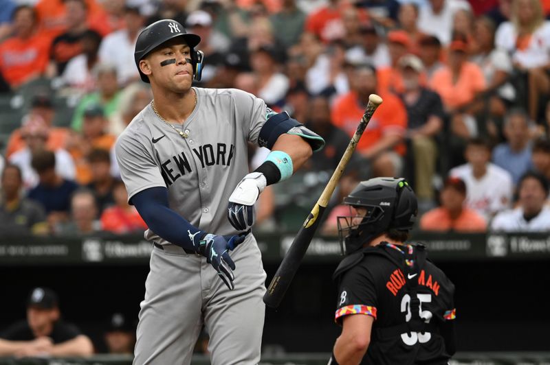 Jul 12, 2024; Baltimore, Maryland, USA;  New York Yankees outfielder Aaron Judge (99) reacts after earning  a first inning walks against the Baltimore Orioles at Oriole Park at Camden Yards. Mandatory Credit: Tommy Gilligan-USA TODAY Sports