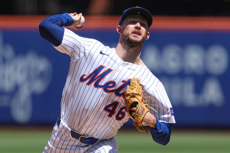 May 11, 2025; New York City, New York, USA; New York Mets starting pitcher Griffin Canning (46) delivers a pitch during the third inning against the Chicago Cubs at Citi Field. Mandatory Credit: Vincent Carchietta-Imagn Images