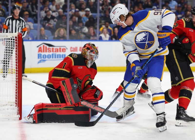 Oct 15, 2025; Buffalo, New York, USA;  Buffalo Sabres right wing Josh Doan (91) looks for a rebound as Ottawa Senators goaltender Leevi Meriläinen (1) makes a save during the second period at KeyBank Center. Mandatory Credit: Timothy T. Ludwig-Imagn Images