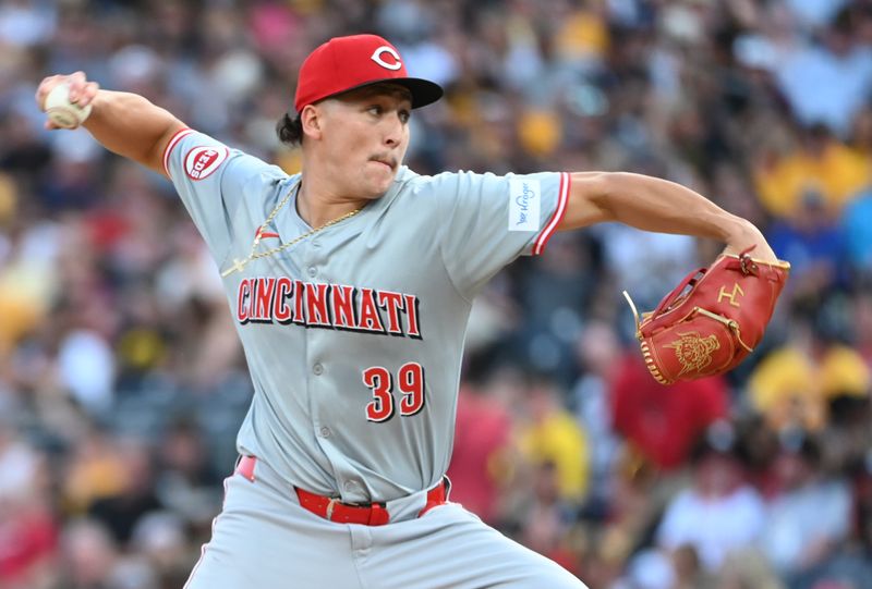 Aug 24, 2024; Pittsburgh, Pennsylvania, USA;   Cincinnati Reds starting pitcher Julian Aguilar (39) throws the ball to the Pittsburgh Pirates at PNC Park. Mandatory Credit: Philip G. Pavely-USA TODAY Sports