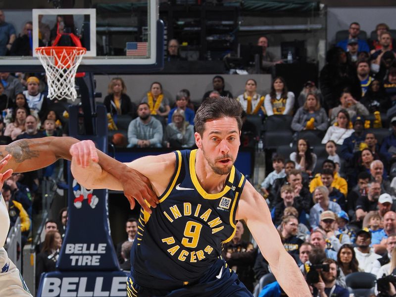 INDIANAPOLIS, IN - MARCH 7: T.J. McConnell #9 of the Indiana Pacers dribbles the ball during the game against the Minnesota Timberwolves on March 7, 2024 at Gainbridge Fieldhouse in Indianapolis, Indiana. NOTE TO USER: User expressly acknowledges and agrees that, by downloading and or using this Photograph, user is consenting to the terms and conditions of the Getty Images License Agreement. Mandatory Copyright Notice: Copyright 2024 NBAE (Photo by Ron Hoskins/NBAE via Getty Images)