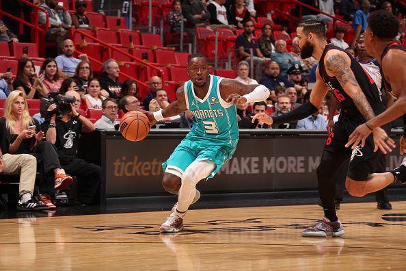 MIAMI, FL - DECEMBER 13: Terry Rozier #3 of the Charlotte Hornets dribbles the ball during the game against the Miami Heat on December 13, 2023 at Kaseya Center in Miami, Florida. NOTE TO USER: User expressly acknowledges and agrees that, by downloading and or using this Photograph, user is consenting to the terms and conditions of the Getty Images License Agreement. Mandatory Copyright Notice: Copyright 2023 NBAE (Photo by Issac Baldizon/NBAE via Getty Images)