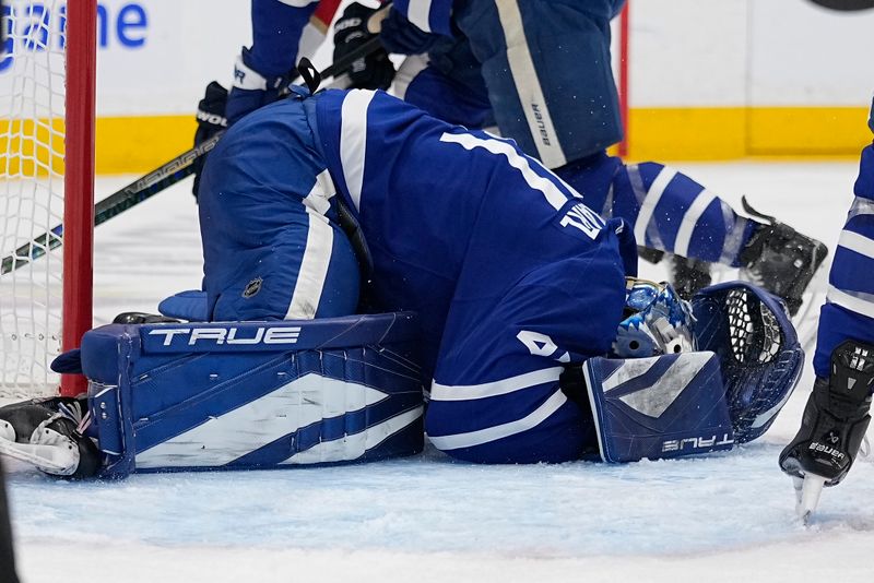 May 5, 2025; Toronto, Ontario, CAN; Toronto Maple Leafs goaltender Anthony Stolarz (41) grabs his head after a collission with Florida Panthers forward Sam Bennett (not pictured) during the second period in game one of the second round of the 2025 Stanley Cup Playoffs at Scotiabank Arena. Mandatory Credit: John E. Sokolowski-Imagn Images