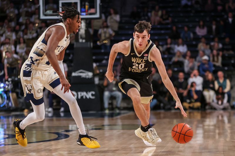 Feb 6, 2024; Atlanta, Georgia, USA; Georgia Tech Yellow Jackets guard Miles Kelly (13) defends Wake Forest Demon Deacons guard Parker Friedrichsen (20) in the first half at McCamish Pavilion. Mandatory Credit: Brett Davis-USA TODAY Sports
