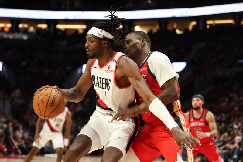 PORTLAND, OREGON - OCTOBER 27: Jerami Grant #9 of the Portland Trail Blazers dribbles as Javonte Green #4 of the New Orleans Pelicans defends during the third quarter at Moda Center on October 27, 2024 in Portland, Oregon. NOTE TO USER: User expressly acknowledges and agrees that, by downloading and or using this photograph, User is consenting to the terms and conditions of the Getty Images License Agreement.? (Photo by Amanda Loman/Getty Images)