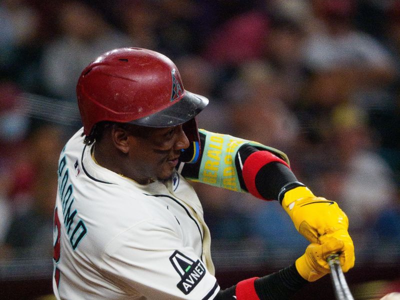 Jun 1, 2025; Phoenix, Arizona, USA; Arizona Diamondbacks infielder Geraldo Perdomo (2) at bat in the third inning against the Washington Nationals at Chase Field. Mandatory Credit: Allan Henry-Imagn Images