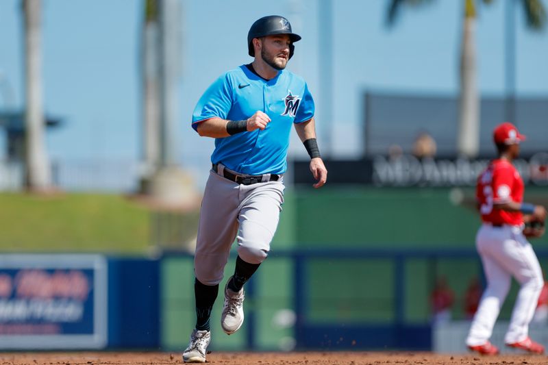 Mar 2, 2023; West Palm Beach, Florida, USA; Miami Marlins second baseman Garrett Hampson (1) runs toward third base during the second inning against the Washington Nationals at The Ballpark of the Palm Beaches. Mandatory Credit: Sam Navarro-USA TODAY Sports