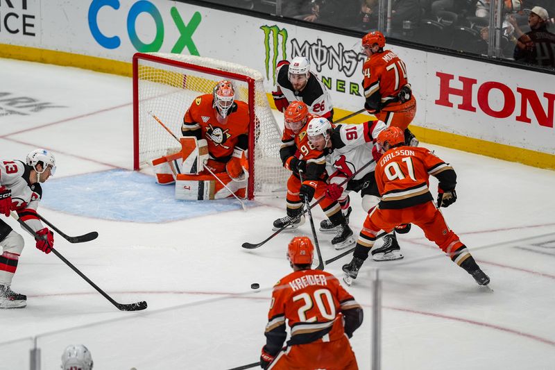 Nov 2, 2025; Anaheim, California, USA; New Jersey Devils center Dawson Mercer (91)  attempts a goal during the second period at Honda Center. Mandatory Credit: Corinne Votaw-Imagn Images